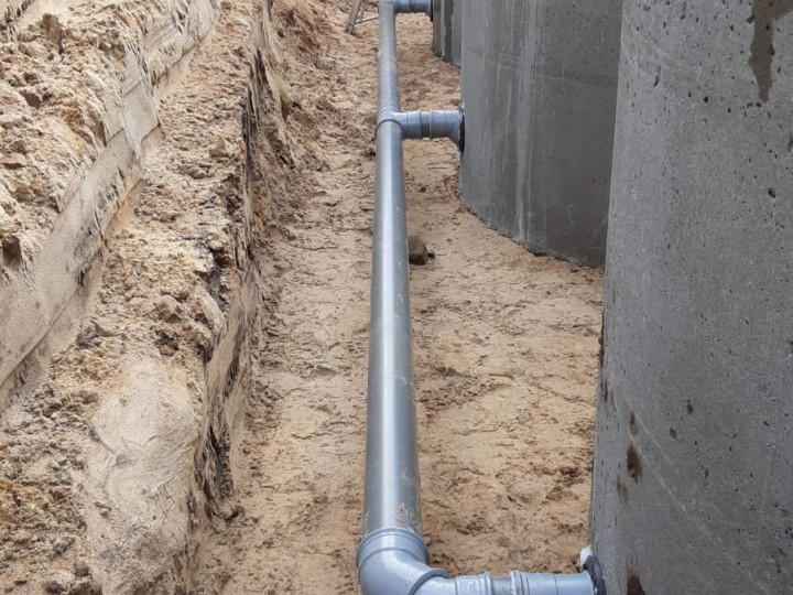 Onderlinge koppeling van drie regenwaterputten
